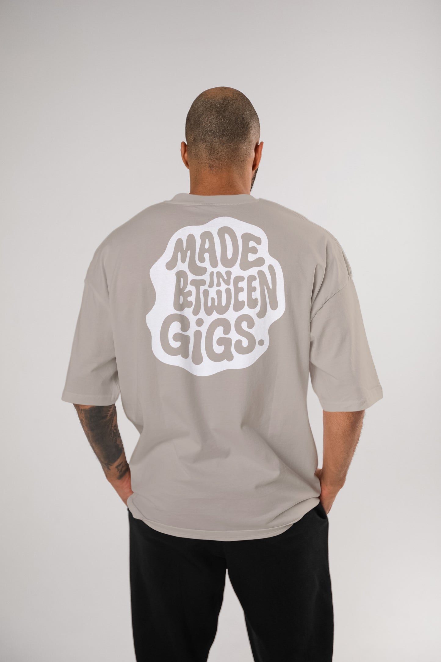 "Made In Between Gigs" Oversized Tee – Broke By Choice Series